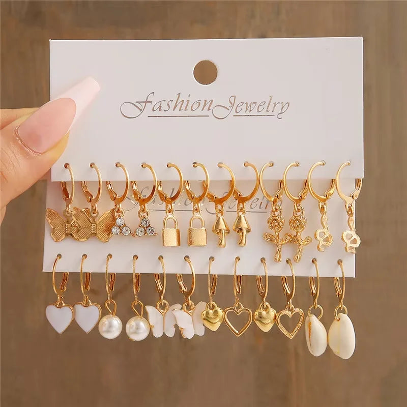 Golden Muse Hoop & Pearl Earring Set – 14-Piece Fashion Collection.