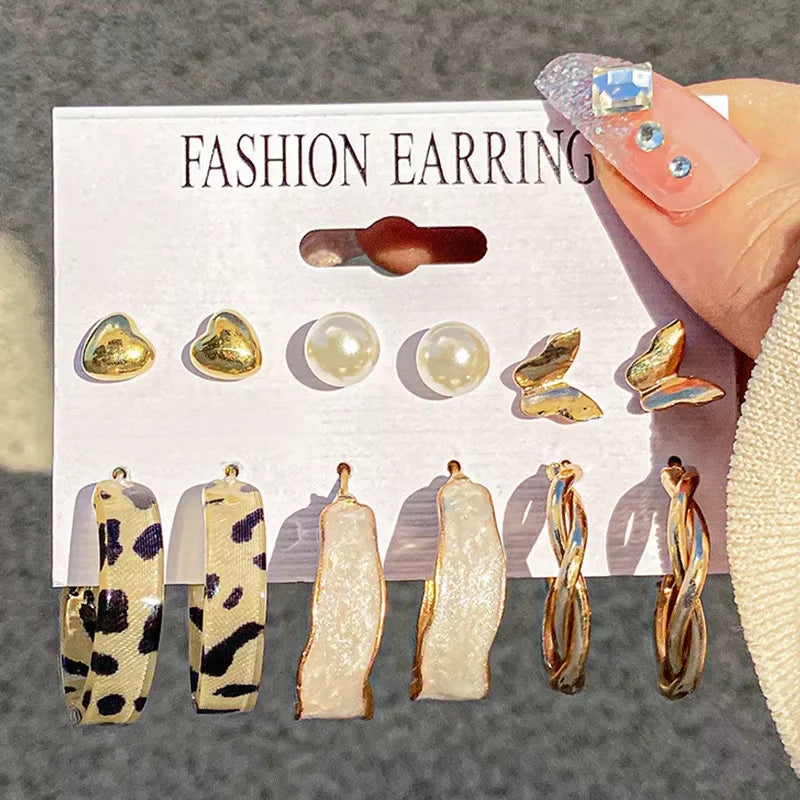 Golden Muse Hoop & Pearl Earring Set – 14-Piece Fashion Collection.