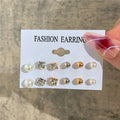 Golden Muse Hoop & Pearl Earring Set – 14-Piece Fashion Collection.